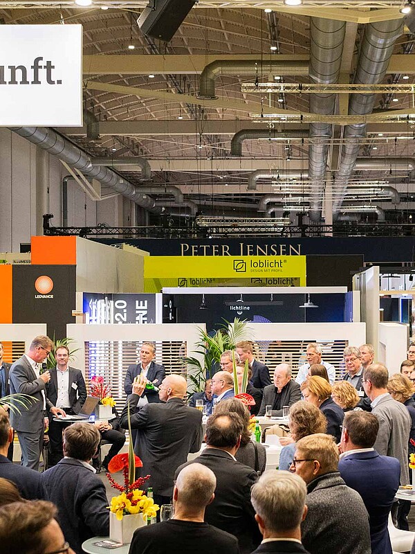 View of the stage of the Light Prize 2024. The audience looks at the speaker.
